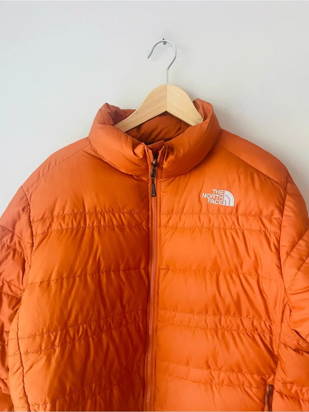 The North Face 550 Orange Rust Puffer Jacket